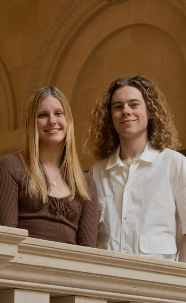 Zero Gravity members Zak and Annabel posing together at Harvard