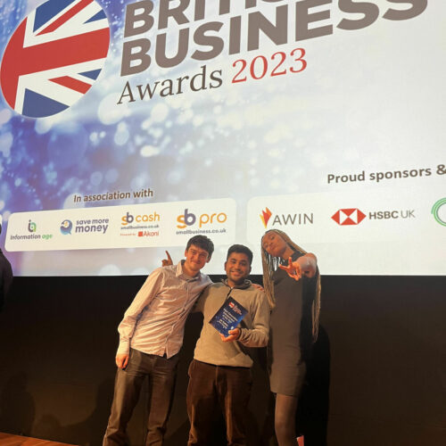 Zero Gravity team members celebrate with their trophy at the British Business Awards